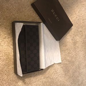 Brown Gucci wallet